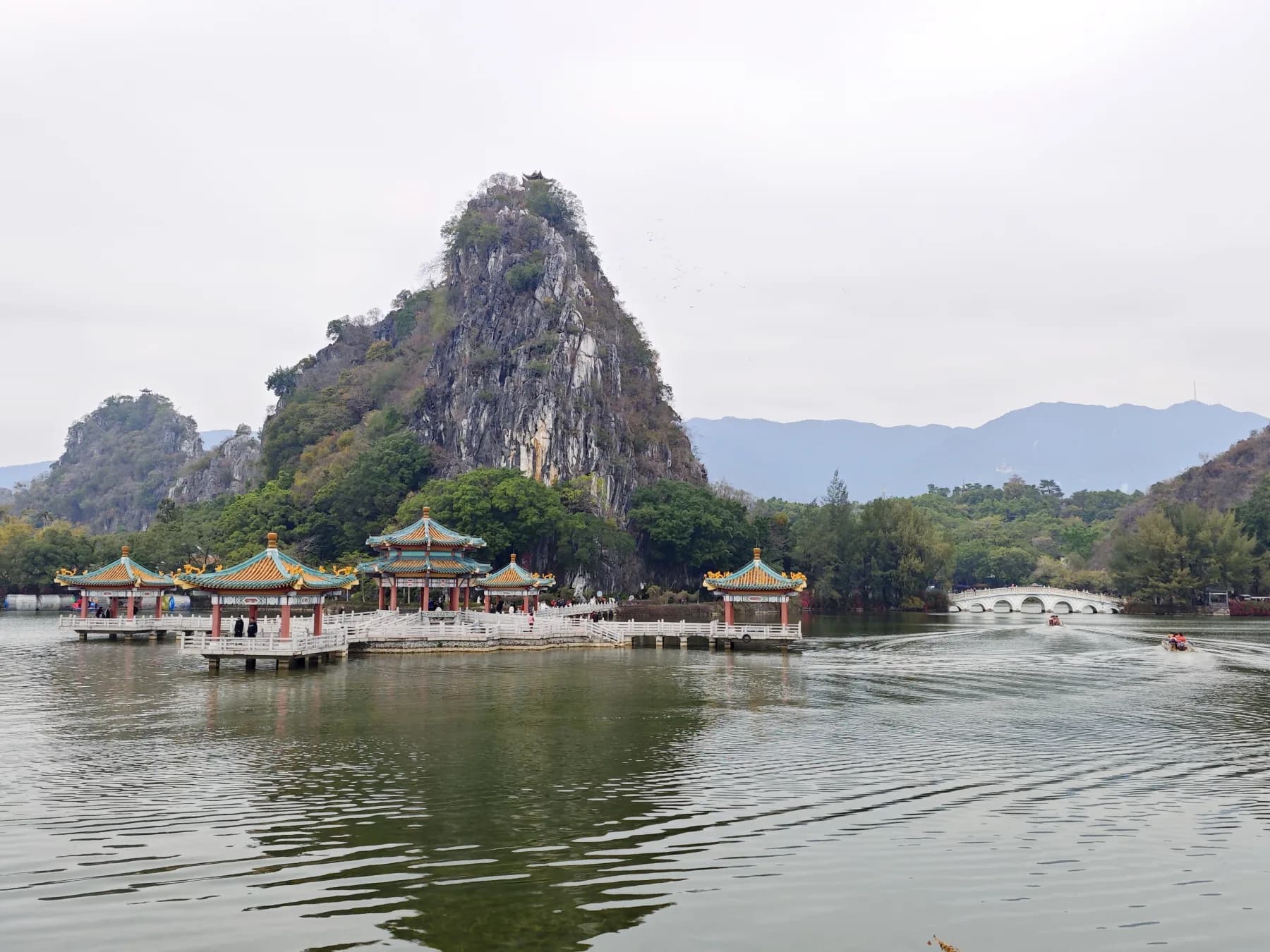 Limestone peaks rising beside Star Lake in Zhaoqing